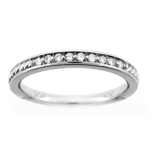 PLATINUM DIAMOND WEDDING BAND with 9 Diamond(s) 0.09ctw