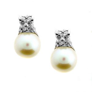 14 KARAT WHITE GOLD EARRINGS with 8 Diamond(s) 0.20ctw