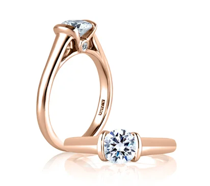 SLEEK CENTER BEZEL, ACCENT PROFILE DIAMOND SOLITAIRE RING