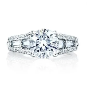 ROUND ENGAGEMENT RING WITH BAGUETTES AT SIDES