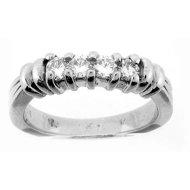 PLATINUM DIAMOND WEDDING BAND with 4 Diamond(s) 0.27ctw